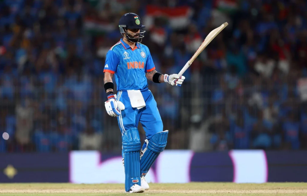 Virat Kohli celebrating a century in Champions Trophy 2025.