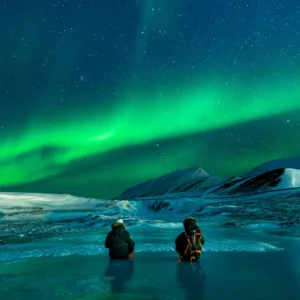 Aurora Borealis lighting up the sky over Iceland’s landscape