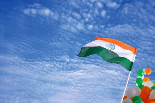 Indian national flag waving proudly at Republic Day 2025 celebrations.
