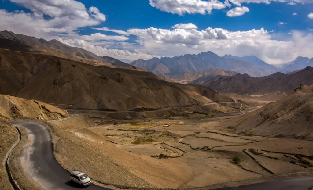 The pristine Pangong Lake in Leh-Ladakh, with mountains in the background.