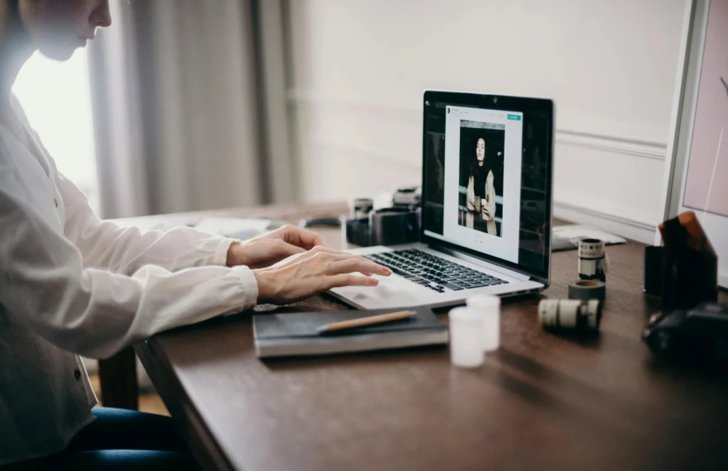 Student working on a laptop at home with flexible online job